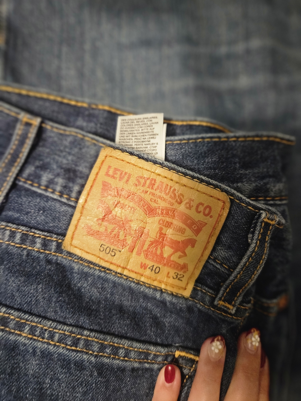 Levi's Men's Relaxed Fit Jeans in Dark Blue with Tan Patch